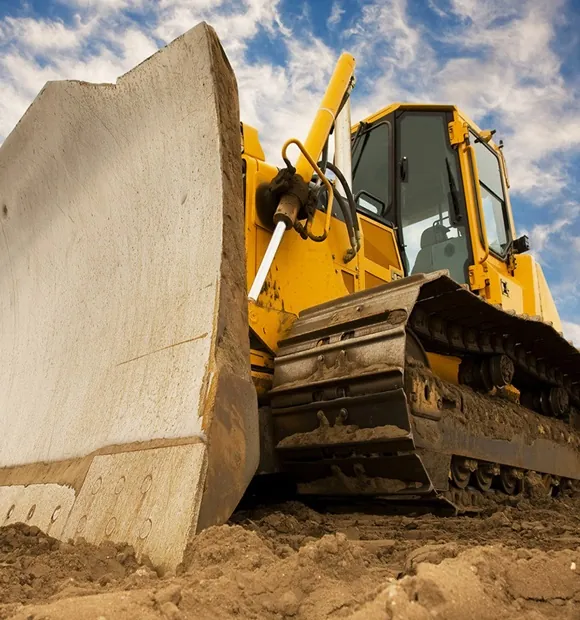 Crawler bulldozer blade in operation